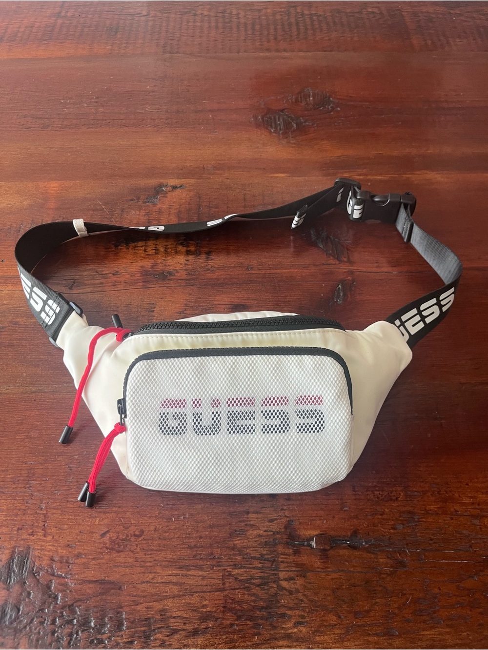 GUESS White Mesh Front Belt Bag with Black Strap and Red Accents